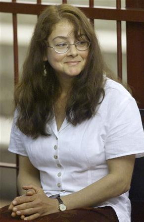 above left) LORI BERENSON is seen in a courtroom in Lima in this ...